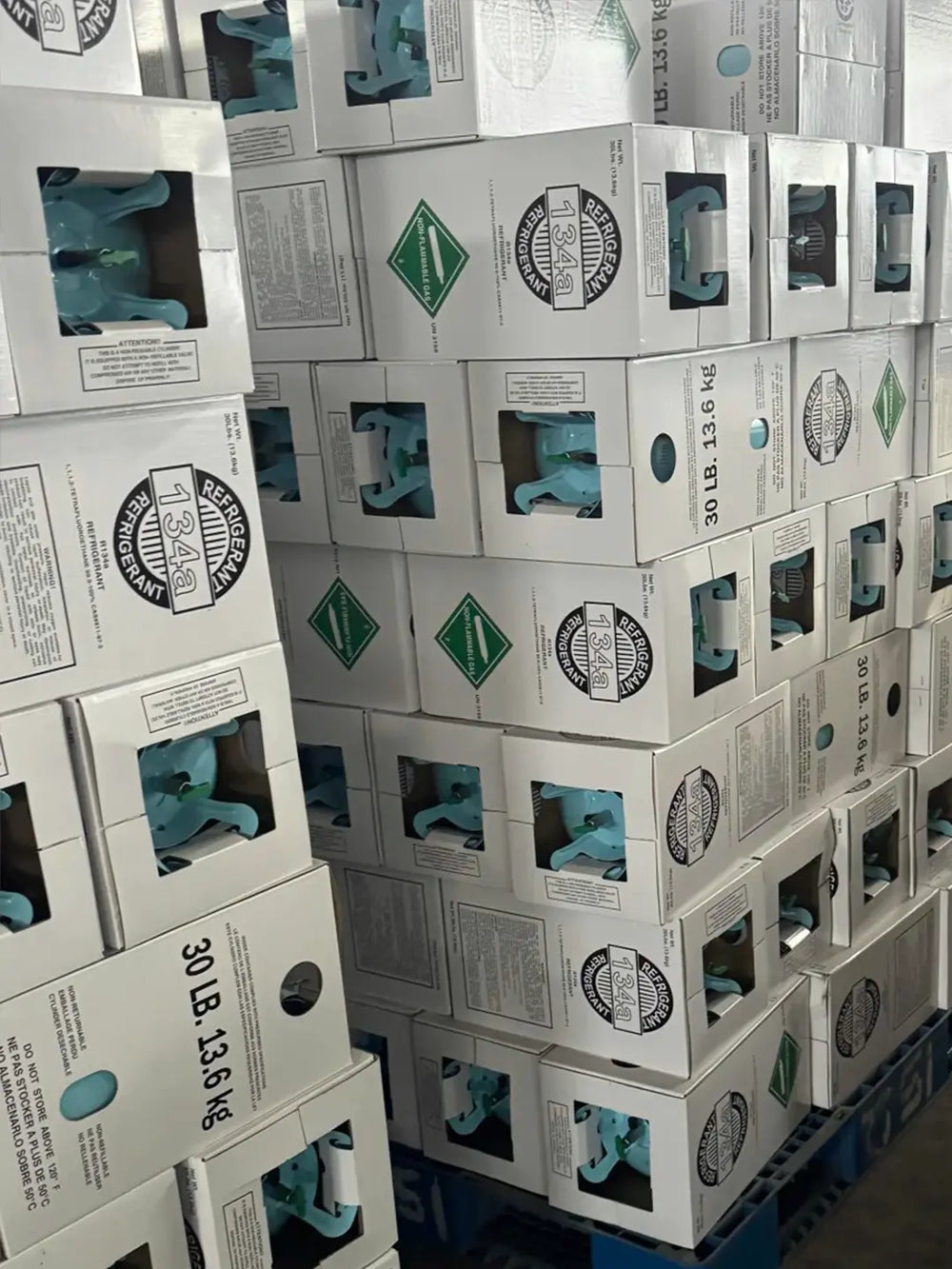 Stacked R134A 30 lb refrigerant boxes in warehouse inventory